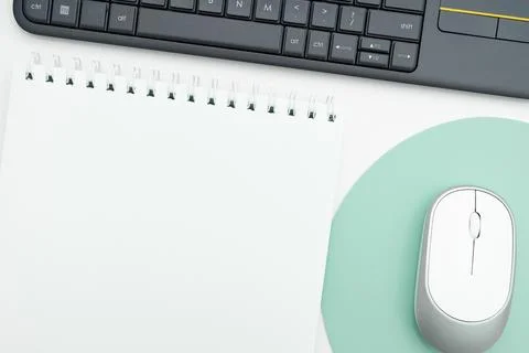 Colored paper with important message lying desk near keyboard. Main information Stock Photos