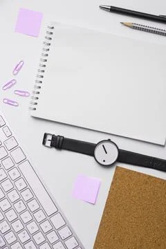 Colored paper with important message lying desk near keyboard. Main information Stock Photos