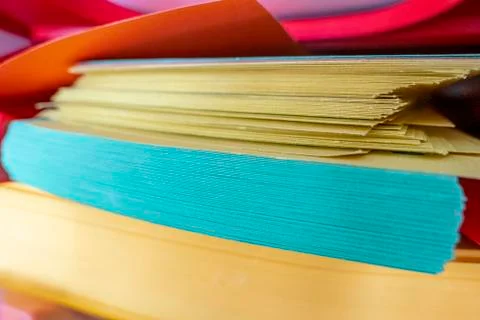 Colored paper on a stack in the office Stock Photos