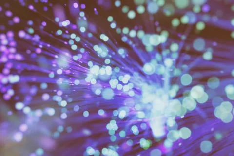 Colored particles fly in space Stock Photos