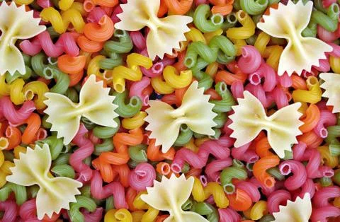 Colored pasta texture background. close up Stock Photos