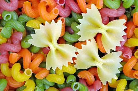 Colored pasta texture background. close up Stock Photos