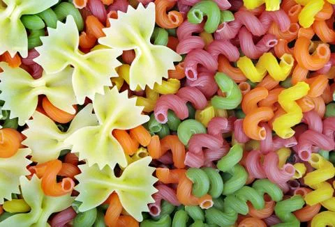 Colored pasta texture background. close up Stock Photos