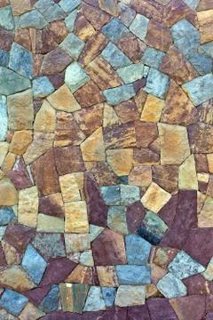 Colored pattern of old stone wall surfaced Stock Photos