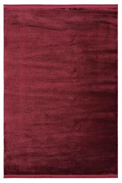 Colored patterned machine carpet on a white background Stock Photos