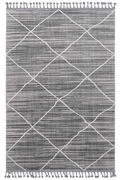 Colored patterned machine carpet on a white background Stock Photos