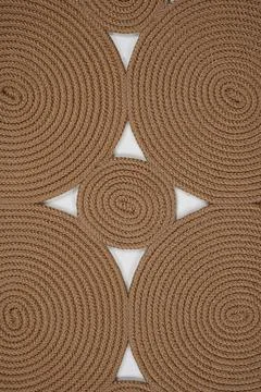 Colored patterned machine carpet on a white background Stock Photos
