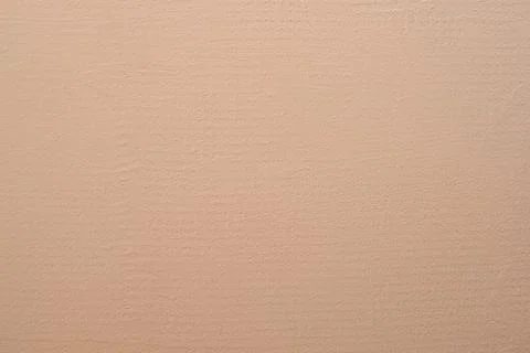 Colored peach wall. Texture. Background. Stock Photos