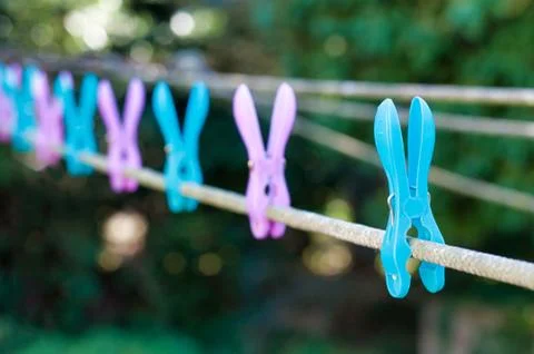 Colored pegs for hanging Foto stock