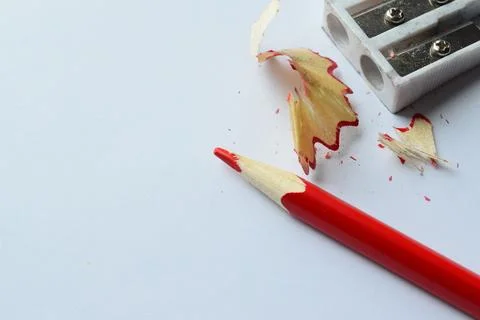 Colored pencil and sharpener Stock Photos