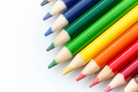 Colored pencils angled on a white background. Stock Photos