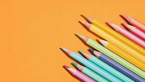 Colored Pencils background corner border. Back to School Stock Photos