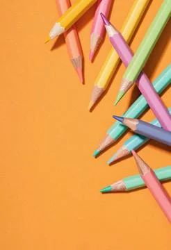 Colored Pencils background corner border. Back to School Stock Photos