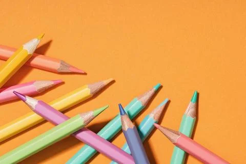 Colored Pencils background corner border. Back to School Stock Photos