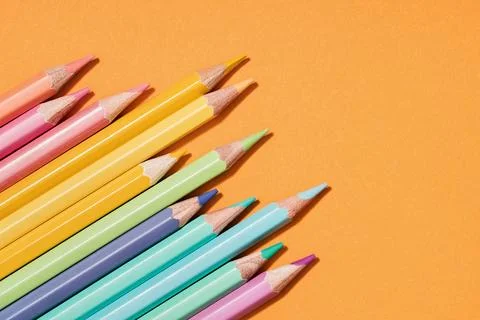 Colored Pencils background corner border. Back to School Stock Photos