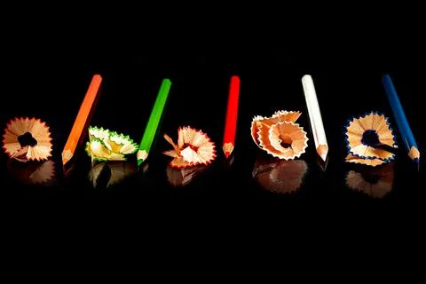 Colored pencils on a black background. Creative activities for children on va Foto stock