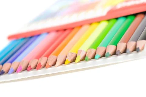 Colored pencils in box Stock Photos
