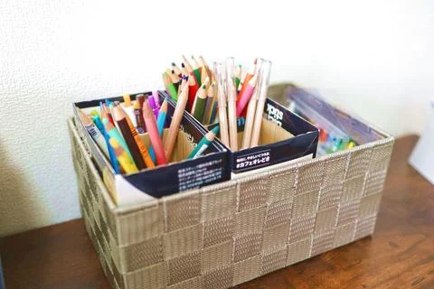 Colored pencils in a box Stock Photos