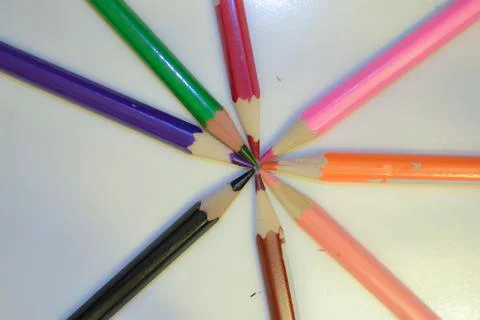Colored pencils in circle Stock Photos