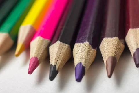 Colored pencils close-up on a white background, for backgrounds and texture,  Stock Photos