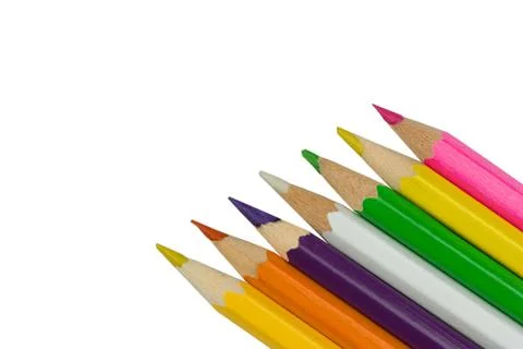 Colored pencils in the corner on white background Foto stock