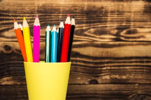 Colored pencils in a cup Stock Photos