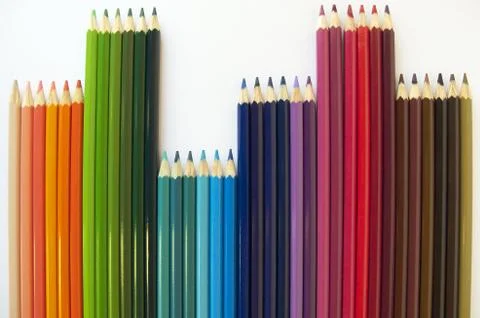 Colored pencils of different sizes, close-up Foto stock