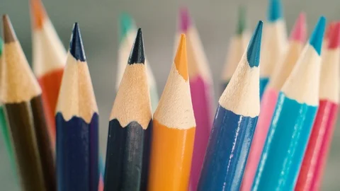 Colored pencils on grey background. Stock Footage 103450943
