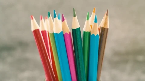 Colored pencils on grey background. Stock Footage 103450965