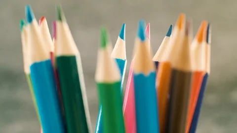 Colored pencils on grey background. Stock Footage 103450998