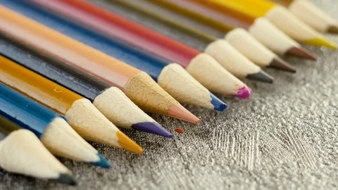 Colored pencils on grey background. Stock Footage 103451567