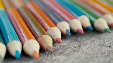 Colored pencils on grey background. Stock Footage 103451574