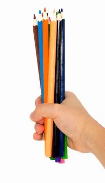 Colored pencils in hand Stock Photos