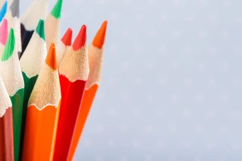 Colored pencils on a light background with point Foto stock
