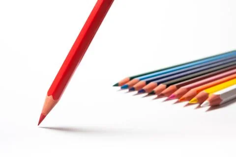 Colored pencils with red one in front. Contrasty version. Stock Photos