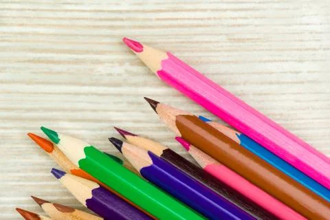 Colored pencils in the right corner Stock Photos