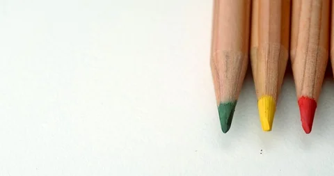 Colored pencils roll out of frame slow motion Stock Footage 113142860