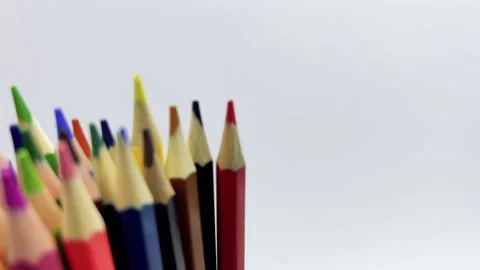 Colored pencils rolling in from the left Video stock 194006289