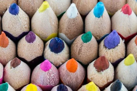 Colored pencils in a row on the bottom Stock Photos