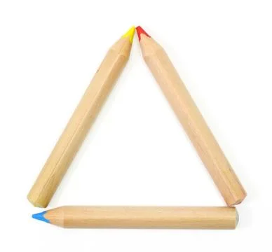Colored pencils set as a triangle frame on white Stock Photos