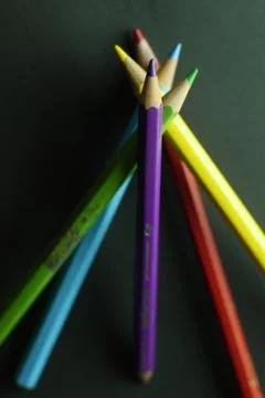 Colored pencils in shape of creative angle Stock Photos