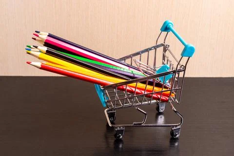 Colored pencils in a shopping trolley. Art set. Fine art. Stock Photos