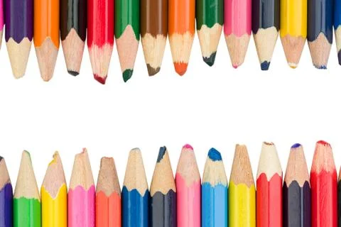 Colored pencils with space for text in the middle on a white background Stock Photos