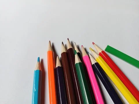 Colored pencils on a white background. Back to school, art drawing. Фото