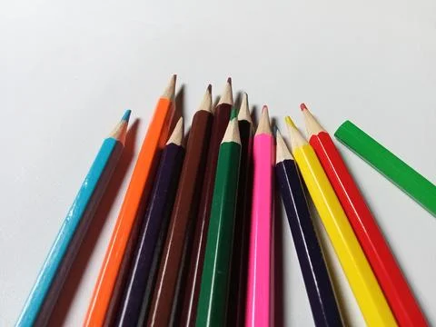 Colored pencils on a white background. Back to school, art drawing. Stock Photos
