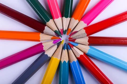 Colored pencils, on white background, pattern, copy space. Stock Photos