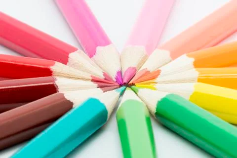 Colored pencils on white background Stock Photos