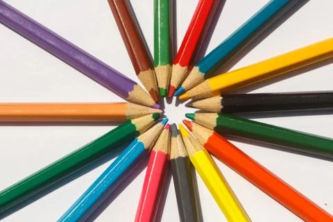 Colored pencils on white background Stock Photos