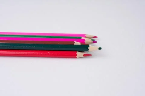 Colored pencils on a white background Stock Photos