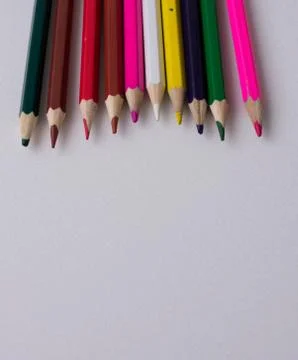 Colored pencils on a white background Stock Photos